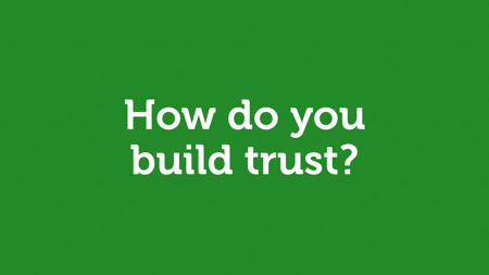 White text on green. “How do you build trust?”