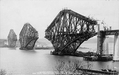 Black-and-white photo from the construction of the Forth Bridge.