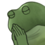 A green cartoon frog holding its hands in prayer