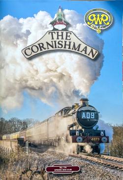 Cover of issue 176. A steam train on a clear winter day is approaching the camera, pulling half a dozen coaches in a variety of coours, with steam billowing from the chimney and engine.
