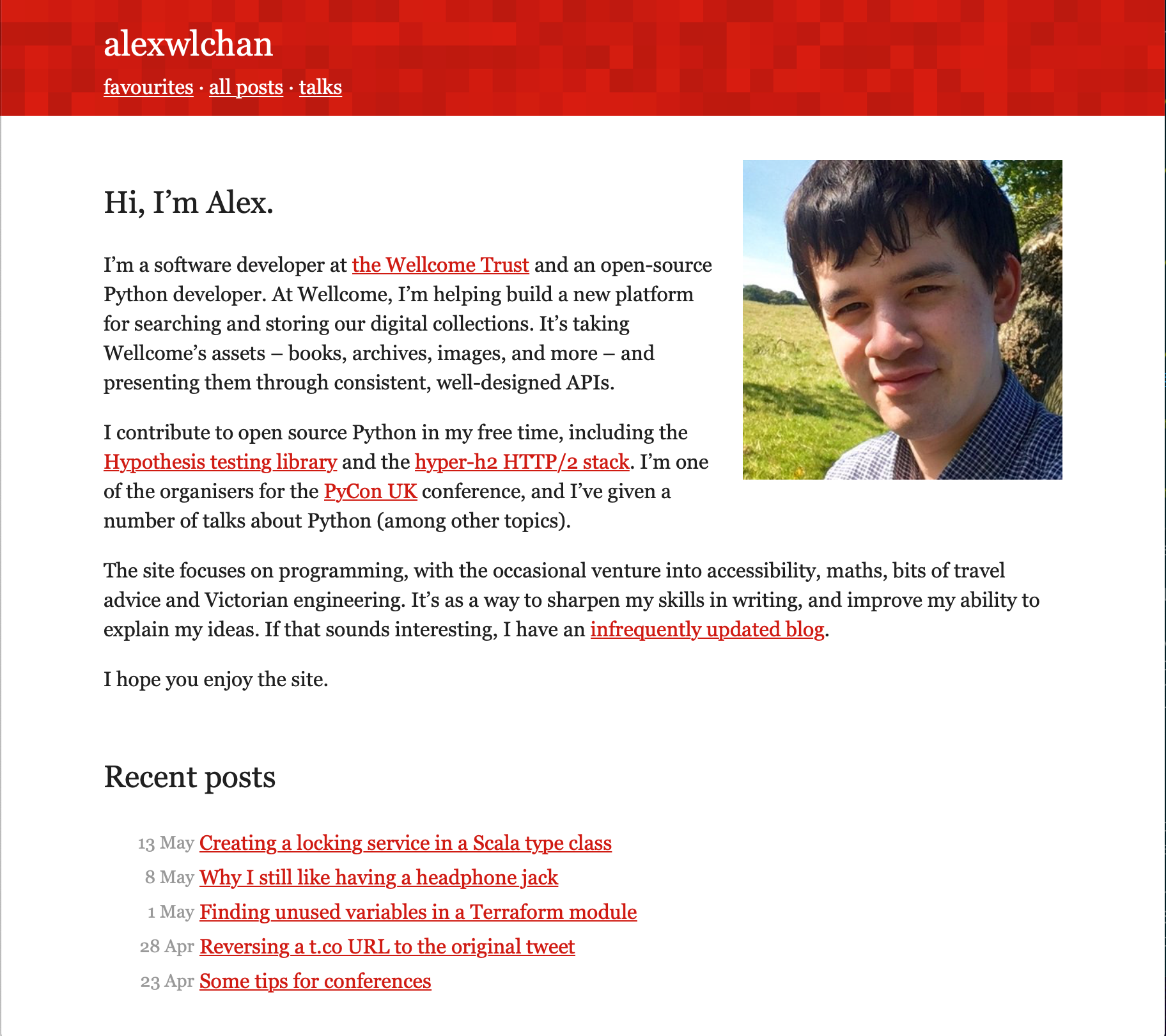 A red stripe along the top of the site, with a large picture of a face on the right and a bio in the body of the page.